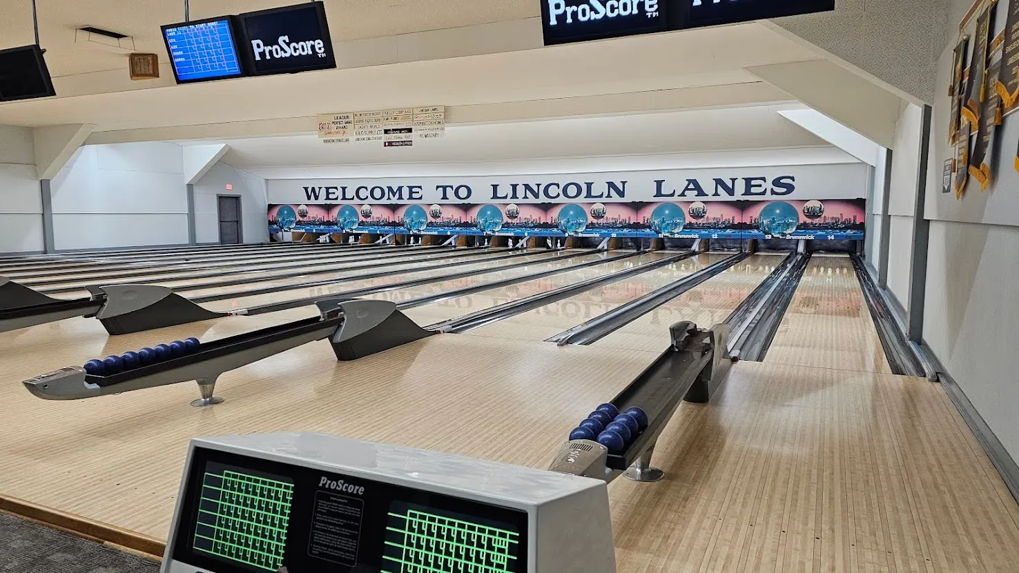 The maple lanes beneath the Welcome to Lincoln Lanes sign inside the Vernon bowling centre
